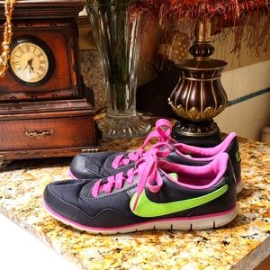 Nike running shoe size eight pink green black